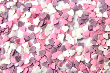 Delicious pink Valentine's Day sugar hearts and ornaments in pink, purple and white show I love you...