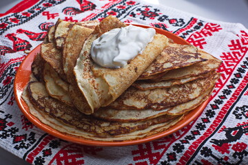  Photo Delicious thin Pancakes With Sour Cream. Traditional Russian Dish. Restaurant Serving.