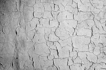 Texture of a concrete wall with cracks and scratches which can be used as a background