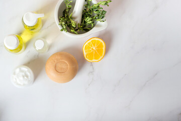 An image of a bottle of olive oil, lemon, spa