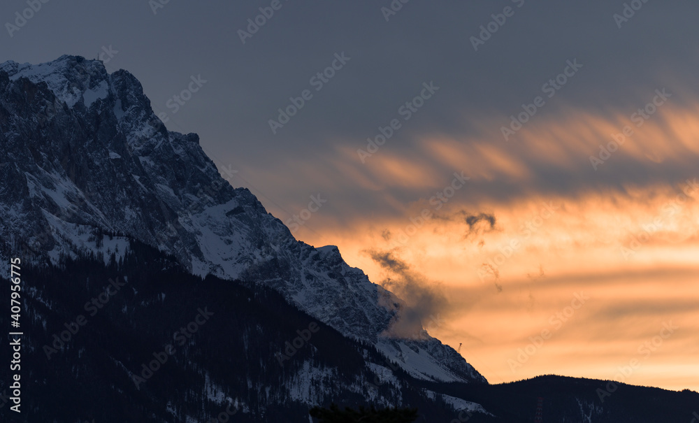 Wall mural sunset in the mountains - background with vertical divider