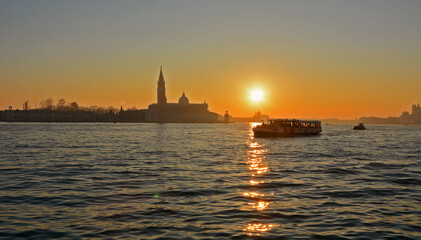 Fototapeta premium Sunset over the church of San Giorgio Maggiore, seen from Venice, Italy 