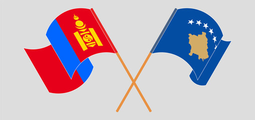 Crossed and waving flags of Mongolia and Kosovo