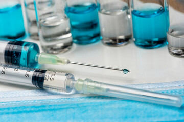 Nobel coronavirus covid-19 vaccine vial a illustrative picture, doctor in the laboratory with a biological tube for analysis and sampling of Covid-19 infectious disea.