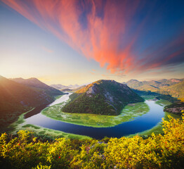 Obraz premium Picturesque scene of winding river Rijeka Crnojevica. Location National park Skadar Lake, Montenegro.