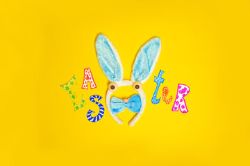 Yellow background with toys for Easter