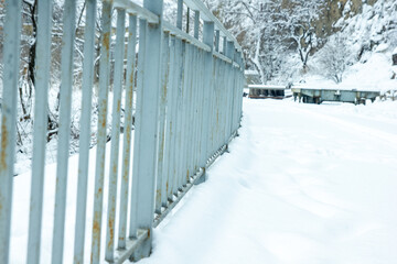 fence in snow, snow covered fence