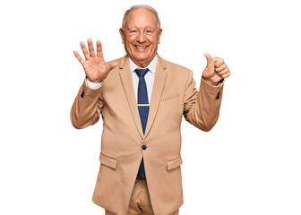 Senior caucasian man wearing business suit and tie showing and pointing up with fingers number six while smiling confident and happy.