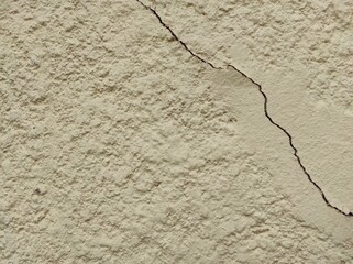 Obraz premium Texture. Wallpaper. Old rough wall painted yellow with chipping. Vintage