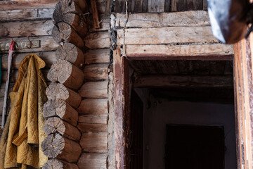 old very low doorway in an ancient log house