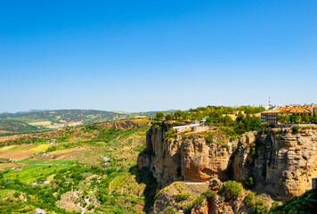 Fototapeta na wymiar Town of Ronda in Andalusia, is famous by its Moorish architecture and amazing views of Tajo gorge