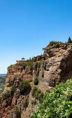 Fototapeta na wymiar Town of Ronda in Andalusia, is famous by its Moorish architecture and amazing views of Tajo gorge