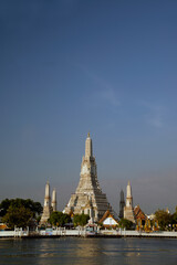 Fototapeta premium Large pagoda of the Buddhist temple is Wat Arun a famous landmark of Thailand in Bangkok capital city.