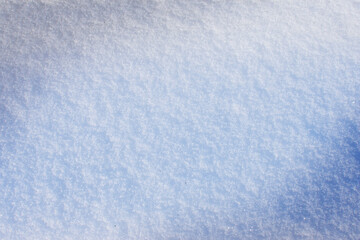 fresh texture snow background in blue tone. Copy space. Winter background. 