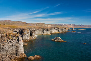 Rocks overlooking the sea in the Snaefellsnes peninsula in western Iceland, near the village of Arnarstapi, Iceland