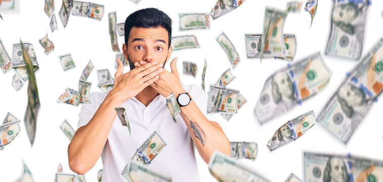 Young handsome hispanic man wearing casual clothes shocked covering mouth with hands for mistake. secret concept.