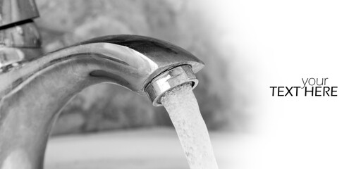 Closeup of the flowing water from the tap