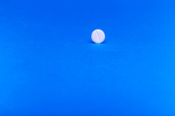 Tablet on a blue background.