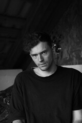 Fototapeta premium portrait of a guy in a black t-shirt