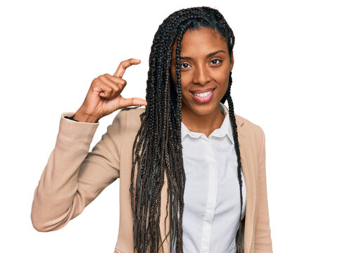 African american woman wearing business jacket smiling and confident gesturing with hand doing small size sign with fingers looking and the camera. measure concept.