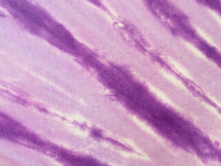 Fototapeta na wymiar Purple Tye-Dye cloth fabric canvas abstract background.