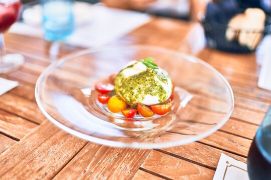 Delicious dish of tomato and burrata cheese salad