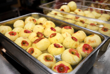 trays of peeled apples 