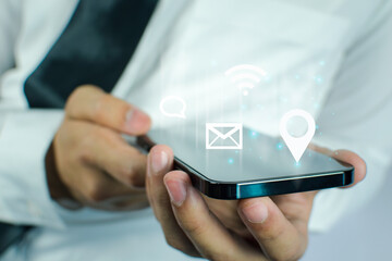 Hand of businessman Working With smartphone Modern Devices, Digital And Computer digital concepts.