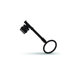 Key - vintage in black color with shadow in white background