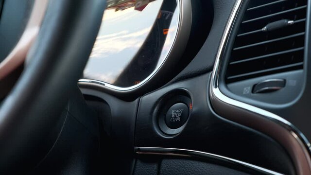 Pressing engine start button