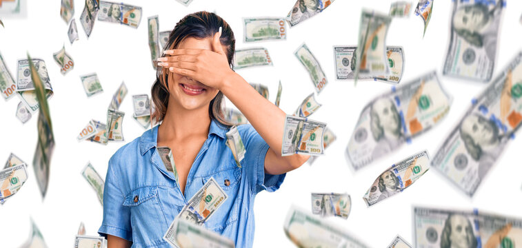 Young beautiful woman wearing casual clothes smiling and laughing with hand on face covering eyes for surprise. blind concept.