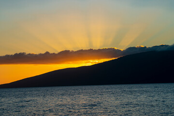 Dramatic sunset with god skies in Hawaii
