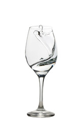 Water swirling in a goblet wine glass, isolated on a white background.