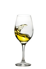 White wine swirling in a goblet wine glass, isolated on a white background