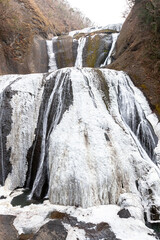 Fototapeta na wymiar 凍結した冬の袋田の滝