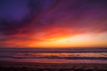 This image captures the beauty of a colorful beach sunset  landscape.