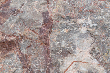 Stone cut - limestone with calcite onyx. Mineral composition: calcite, hematite, clay minerals. Torgashinskoye deposit, East Sayan, Krasnoyarsk Territory.