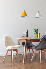 Modern design interior of dining room, kitchen, white furniture