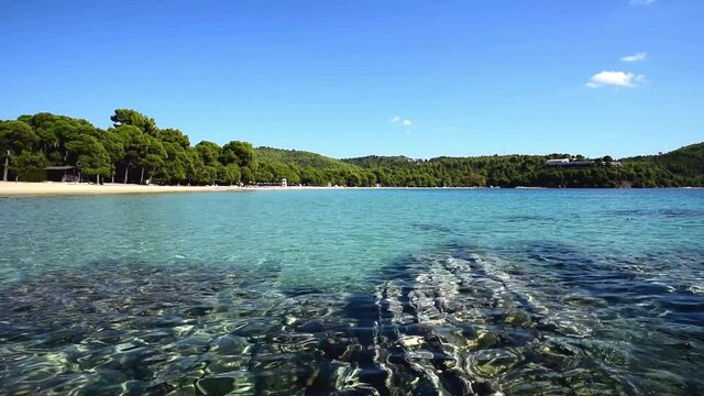 The clear water of the sea in Koukounaries beach, Skiathos island in Greece