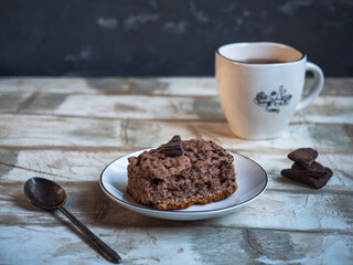 Delicious sweet lance with sponge cake and tea in a white dish