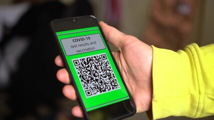 QR code app during Coronavirus pandemic. COVID-19 Test Results on the smartphone screen. Data on movement, contacts with infected, crossing the state border, the presence of antibodies, vaccination