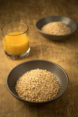 Dried steel cut oats and orange juice.