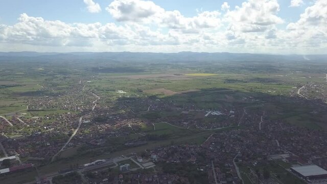An aerial view of the buildings, roads, and water at the Brcko district, Bosnia and Herzegovina in HD