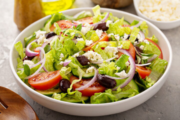Vegetarian greek salad with vinaigrette dressing and feta cheese