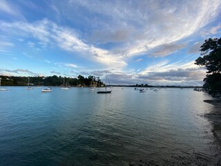 Sunset view for a calm beach, Herald Island in Auckland