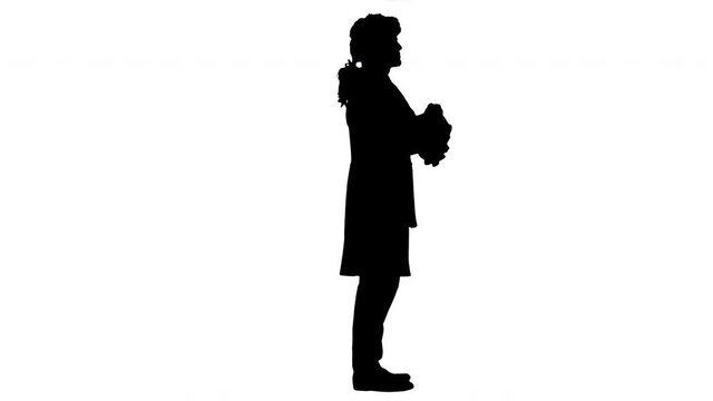 Silhouette Man dressed as Mozart greeting someone.