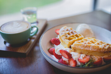 waffle pancake desert with vanilla ice cream, fresh strawberry and honey syrup - 408016788