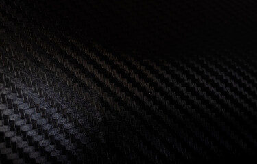 Carbon fiber texture background with right light Carbon fiber composite raw material background