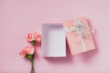 Gift box with carnation flowers