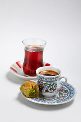 Turkish tea and coffee in traditional cups on white